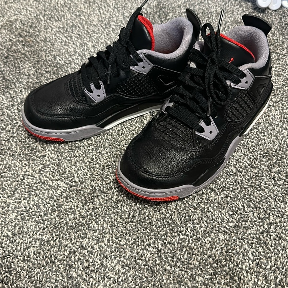 Jordan 4 kids size 1, kept in great condition “Bred Reimagined”.
